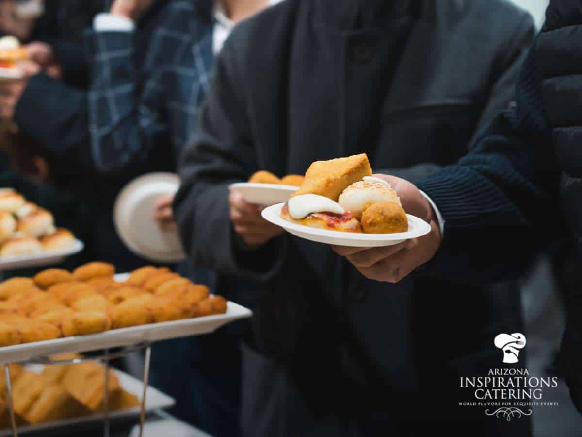 Guests selecting items from a thoughtful Funeral Catering menu during a memorial service