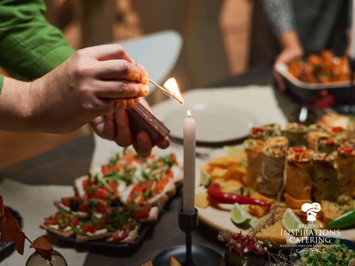 Preparing a candle for a birthday celebration with delicious food, perfect for birthday party catering