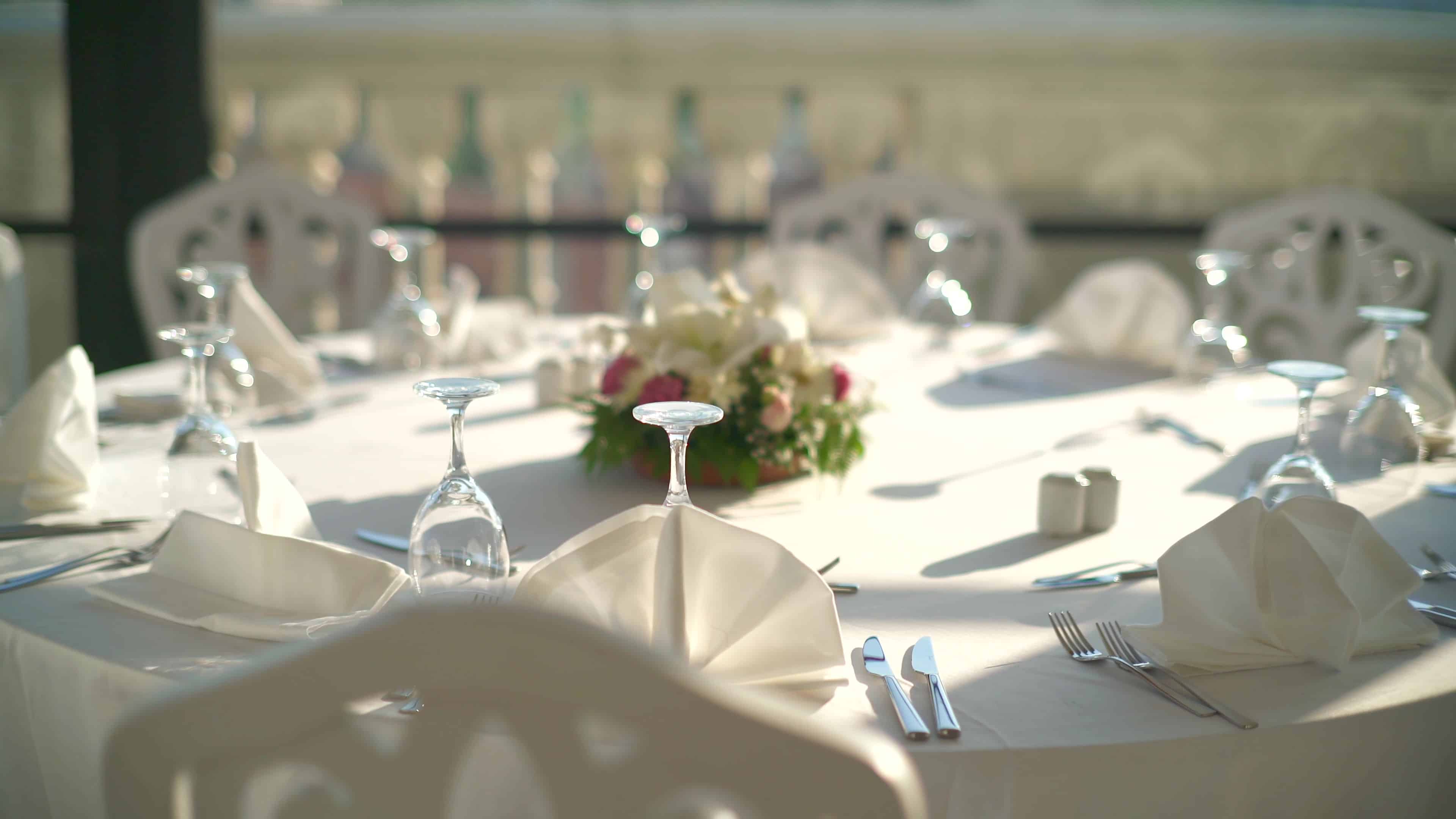 Thoughtfully arranged tables for a funeral or memorial reception